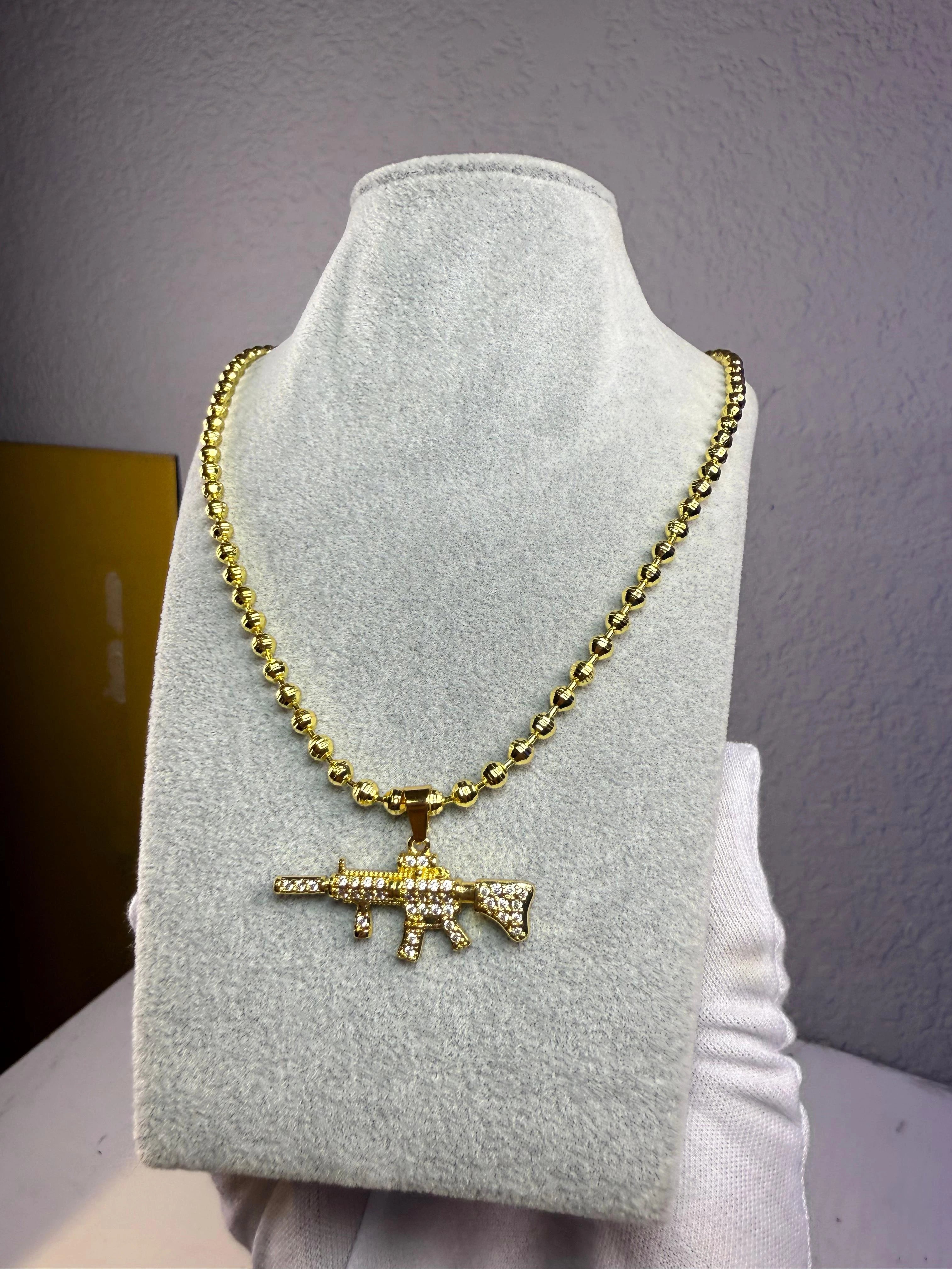 SET CADENA Y DIJE SEGURIDAD ORO LAMINADO 18K