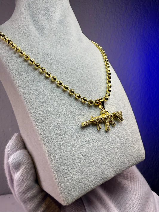 SET CADENA Y DIJE SEGURIDAD ORO LAMINADO 18K