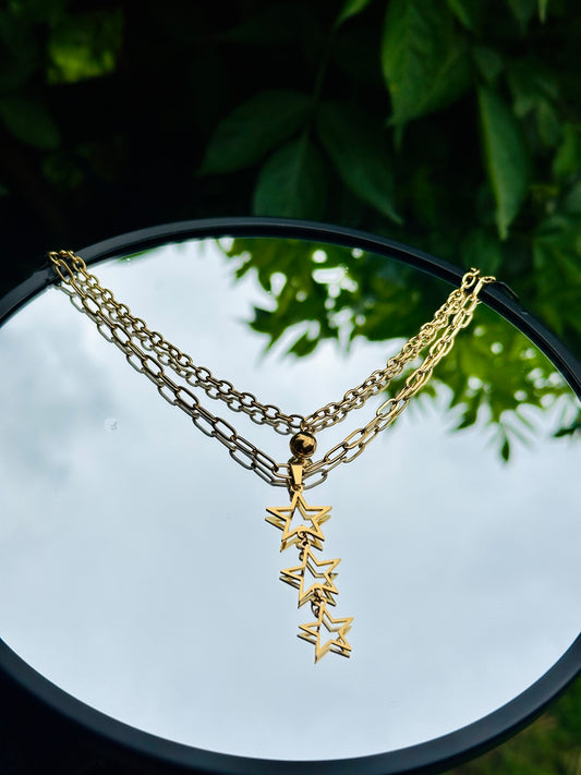 Collar y Aretes de Estrella en Oro 18K